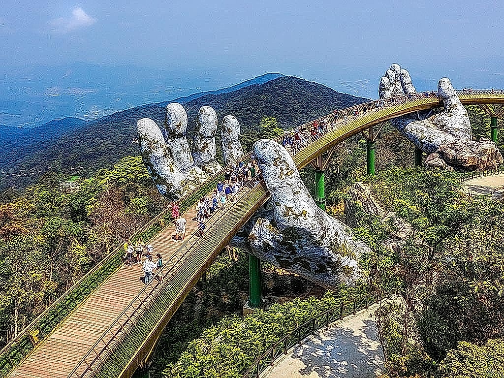 Golden Bridge held by giant stone hands in Da Nang